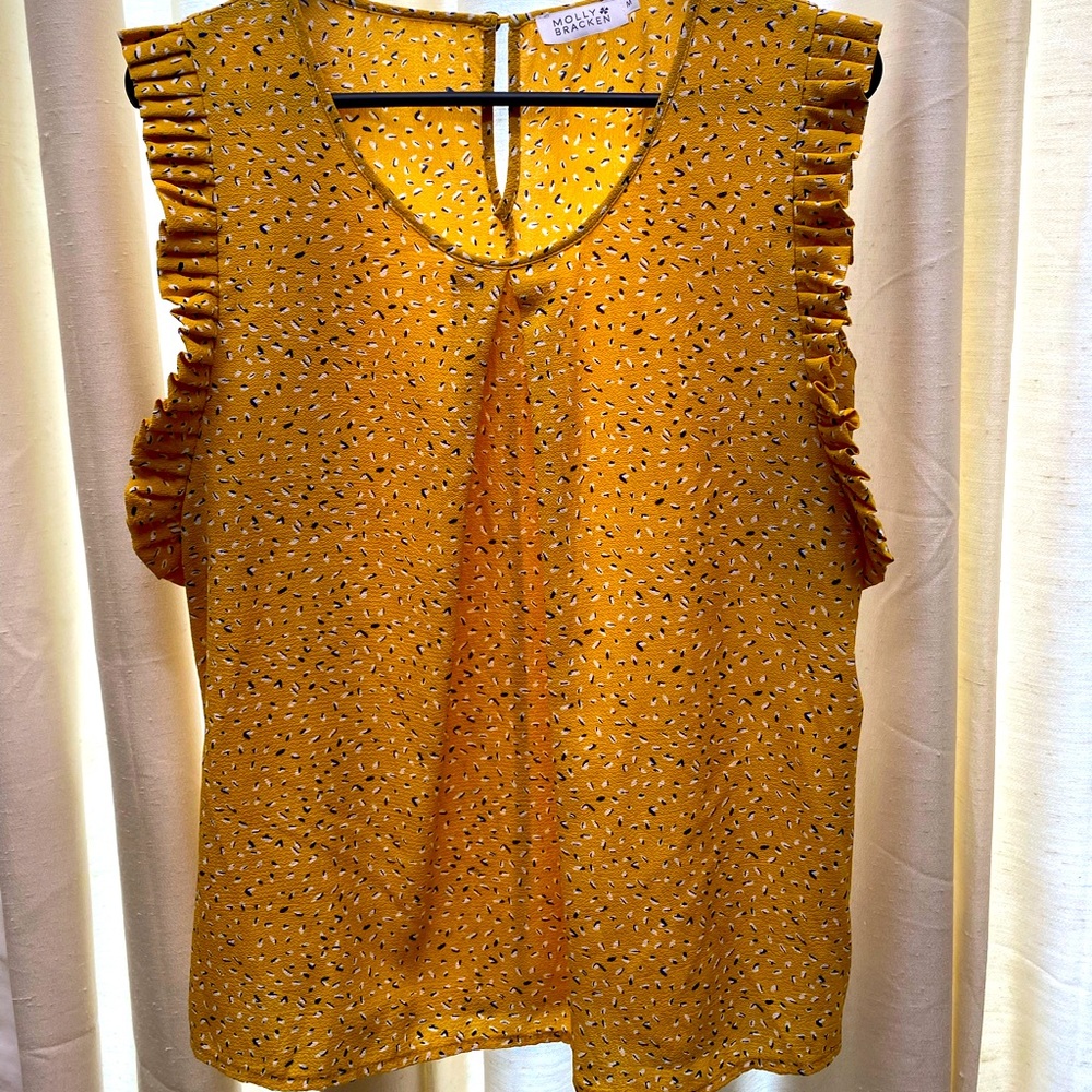 Mustard yellow sleeveless blouse